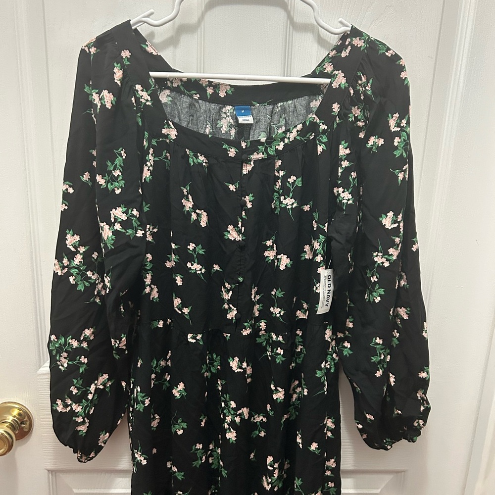 Beautiful thin long sleeved dress. New with tags.